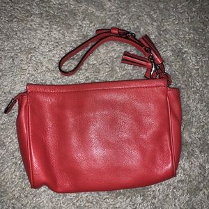 Genuine COACH coral leather wristlet